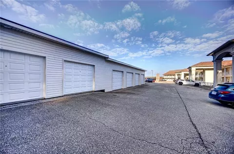 Exterior - 100 Trinity Pointe Dr #1N, Camdenton, MO 65020 photo 6 of 7