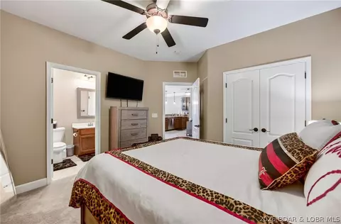 Bedroom - 100 Trinity Pointe Dr #1N, Camdenton, MO 65020 photo 4 of 6