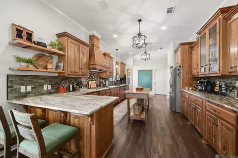 Kitchen - 15693 Alphonse Forbes Rd, Pride, LA 70770 photo 2 of 4