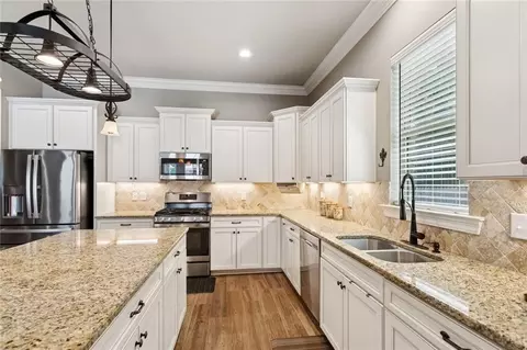 Kitchen - 327 Saw Grass Loop, Covington, LA 70435 photo 2 of 2