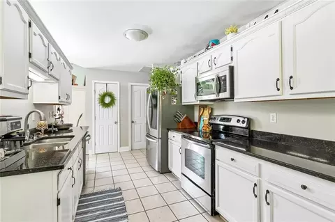 Kitchen - 225 Swallow St, Covington, LA 70433 photo 1 of 2