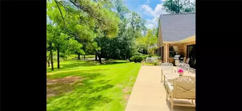 Exterior - 14 Riverbend Ln, Covington, LA 70433 photo 3 of 10