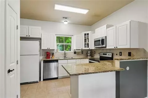 Kitchen - 22397 Gemstone Pl, Robert, LA 70455 photo 1 of 2