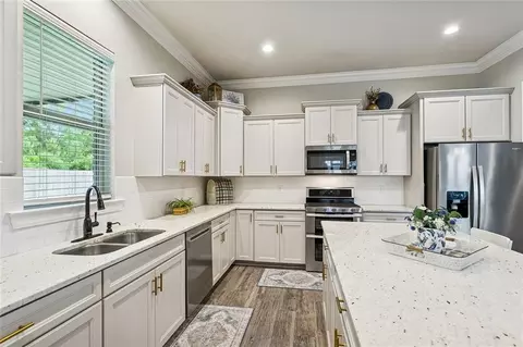 Kitchen - 213 Saw Grass Loop, Covington, LA 70435 photo 2 of 2