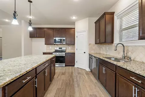 Kitchen - 444 Tiger Ave, Covington, LA 70433 photo 3 of 4