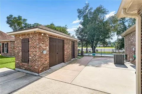 Exterior - 286 Saw Grass Loop, Covington, LA 70435 photo 9 of 12