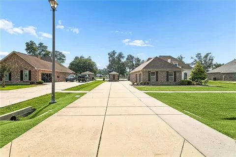 Exterior - 286 Saw Grass Loop, Covington, LA 70435 photo 10 of 12