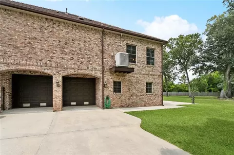 Exterior - 408 W Chase Ct, Mandeville, LA 70448 photo 6 of 13