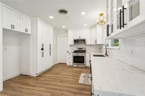 Kitchen - 220 E 8th Ave, Covington, LA 70433 photo 2 of 2
