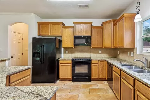 Kitchen - 22421 Gemstone Pl, Robert, LA 70455 photo 1 of 1