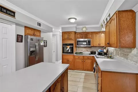 Kitchen - 1073 9th St, Slidell, LA 70458 photo 2 of 3