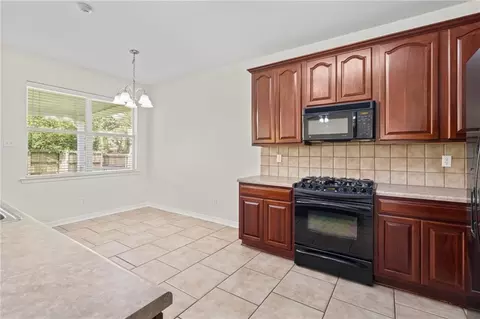 Kitchen - 569 Moore Blvd, Covington, LA 70433 photo 1 of 2