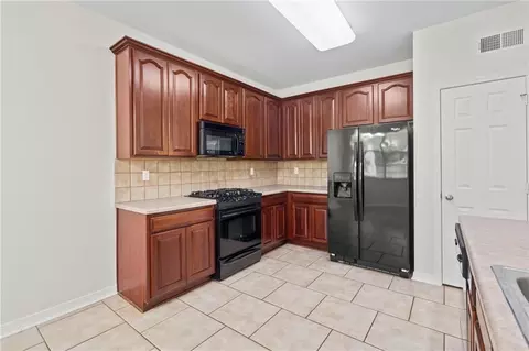 Kitchen - 569 Moore Blvd, Covington, LA 70433 photo 2 of 2