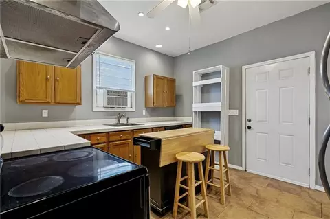 Kitchen - 413 3rd Ave, Harvey, LA 70058 photo 2 of 2