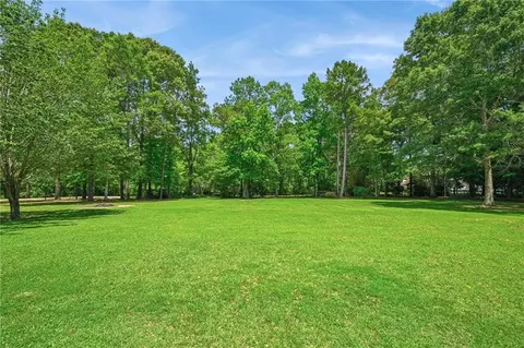 Exterior - 52 Bleu Lake Dr, Covington, LA 70435 photo 7 of 11