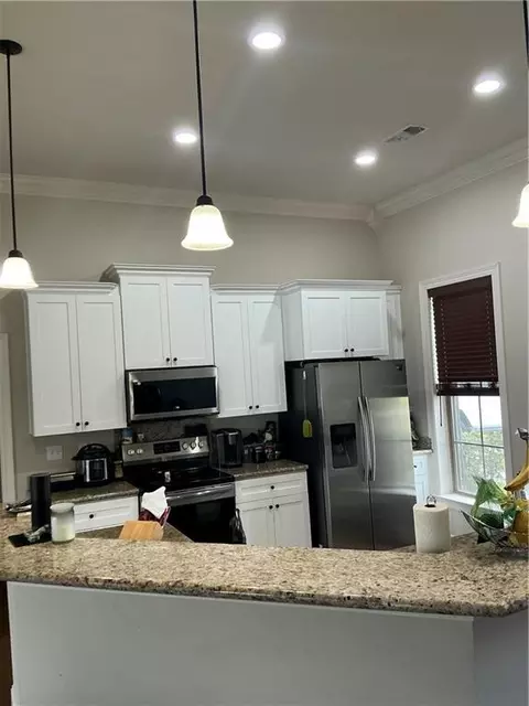 Kitchen - 18257 Wolf Pack Trce, Loranger, LA 70446 photo 3 of 3
