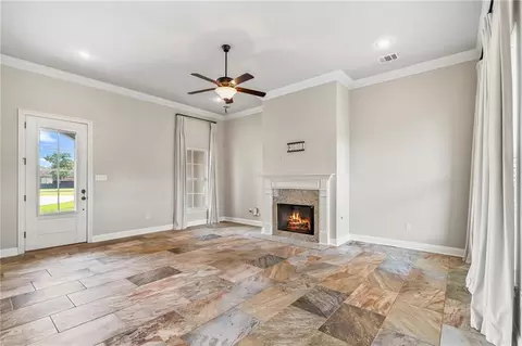 Living - 869 Capistrano Ct, Covington, LA 70433 photo 3 of 5