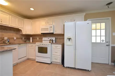 Kitchen - 825 Oak St, Slidell, LA 70458 photo 2 of 2