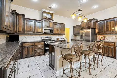 Kitchen - 209 Beebalm Cir, Covington, LA 70435 photo 2 of 3