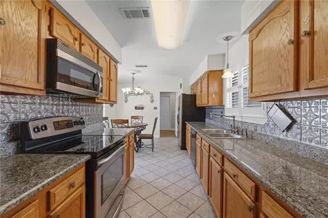 Kitchen - 320 Drury Ln, Slidell, LA 70460 photo 3 of 3