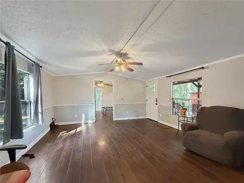Living - 79183 Honeysuckle Estates Loop, Covington, LA 70435 photo 2 of 2
