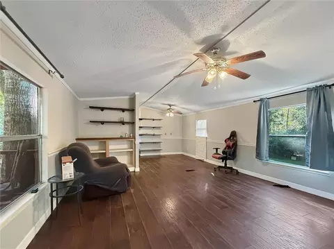 Living - 79183 Honeysuckle Estates Loop, Covington, LA 70435 photo 1 of 2