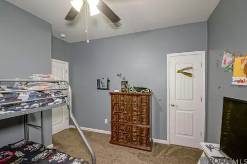 Bedroom - 34870 Spring Trails Dr, Walker, LA 70785 photo 5 of 6