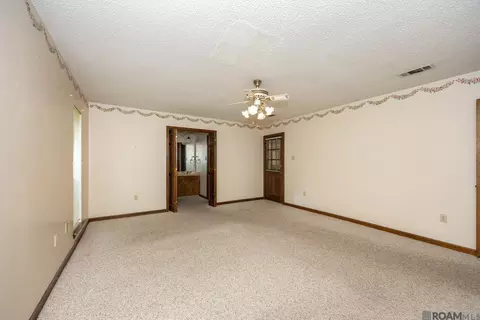 Bedroom - 14913 Crystal Dr, Pride, LA 70770 photo 2 of 5
