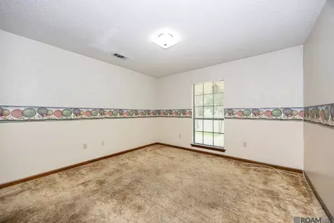 Bedroom - 14913 Crystal Dr, Pride, LA 70770 photo 4 of 5
