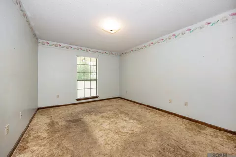 Bedroom - 14913 Crystal Dr, Pride, LA 70770 photo 3 of 5