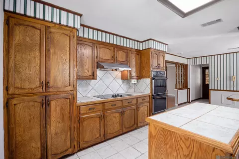 Kitchen - 14676 Picou Rd, Maurepas, LA 70449 photo 3 of 4
