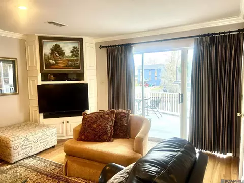 Living - 32875 Rivergate Cir # 1, Springfield, LA 70462 photo 2 of 3
