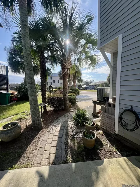 Exterior - 32875 Rivergate Cir # 1, Springfield, LA 70462 photo 5 of 12