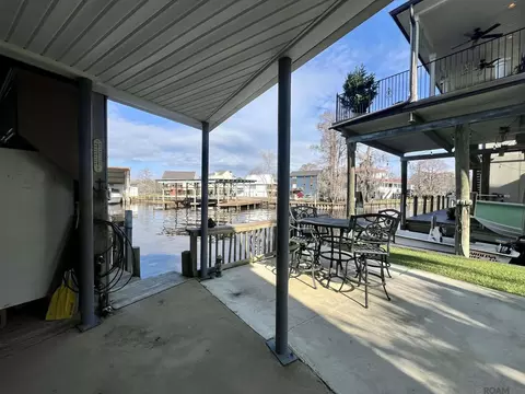 Exterior - 32875 Rivergate Cir # 1, Springfield, LA 70462 photo 6 of 12