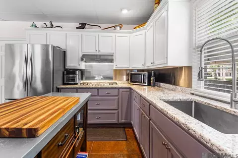 Kitchen - 31719 River Pines Dr, Springfield, LA 70462 photo 5 of 5