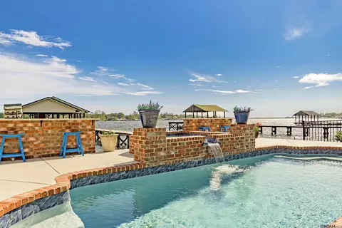 Exterior - 7890 False River Rd, Oscar, LA 70762 photo 5 of 13