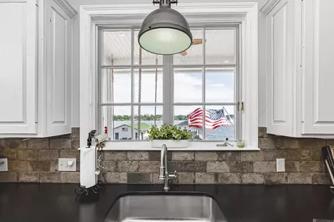Kitchen - 7890 False River Rd, Oscar, LA 70762 photo 5 of 7