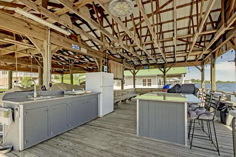 Kitchen - 7890 False River Rd, Oscar, LA 70762 photo 6 of 7