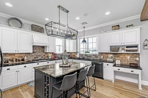 Kitchen - 7890 False River Rd, Oscar, LA 70762 photo 1 of 7