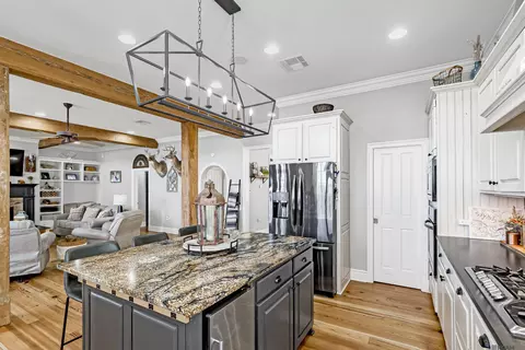 Kitchen - 7890 False River Rd, Oscar, LA 70762 photo 4 of 7