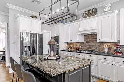 Kitchen - 7890 False River Rd, Oscar, LA 70762 photo 2 of 7