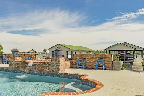 Exterior - 7890 False River Rd, Oscar, LA 70762 photo 9 of 13