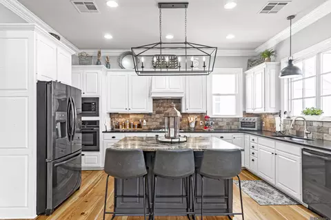 Kitchen - 7890 False River Rd, Oscar, LA 70762 photo 3 of 7