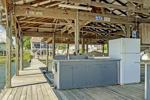 Kitchen - 7890 False River Rd, Oscar, LA 70762 photo 7 of 7