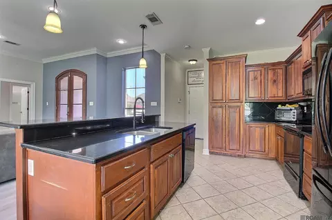 Kitchen - 31025 Lake Spring Dr, Walker, LA 70785 photo 7 of 7
