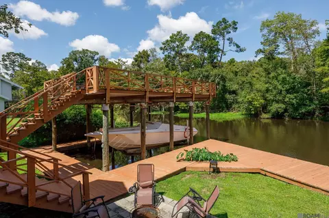 Exterior - 31792 River Pines Dr, Springfield, LA 70462 photo 9 of 16