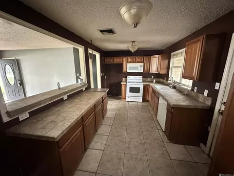 Kitchen - 364 Hickory Dr, Slidell, LA 70458 photo 2 of 2