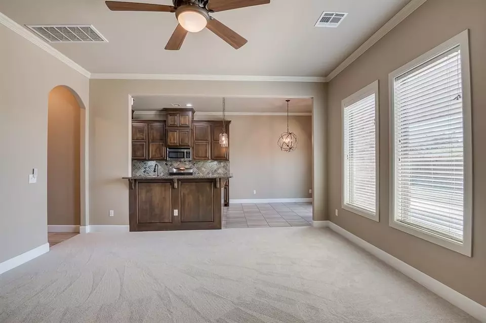 Living - 928 NW 191st St, Edmond, OK 73012 photo 2 of 2