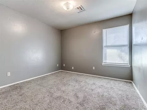Bedroom - 919 E 2nd St, Cushing, OK 74023 photo 3 of 7