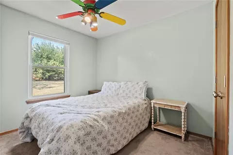 Bedroom - 138 E Carson Ln, Mustang, OK 73064 photo 2 of 4